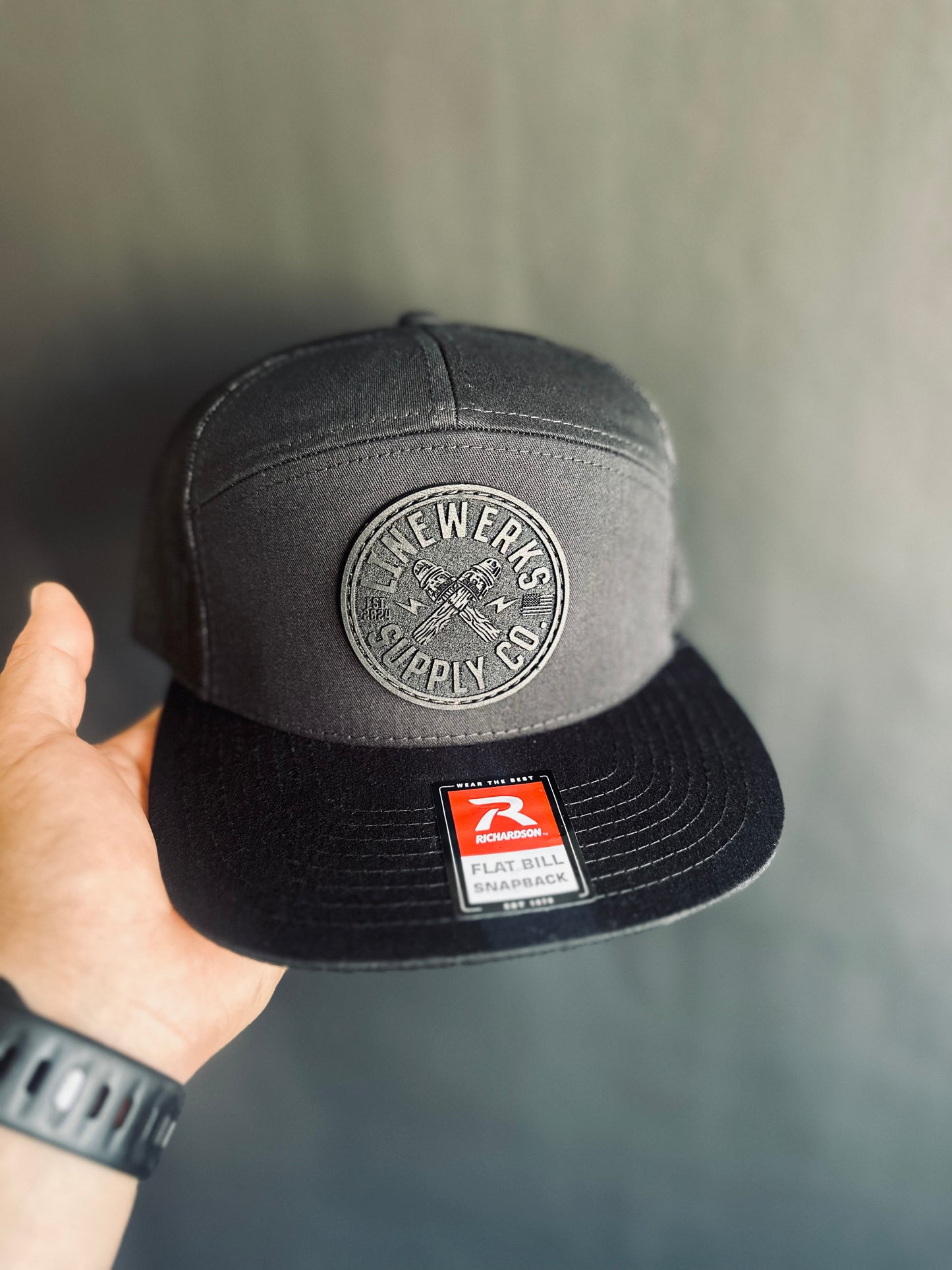 168-LP Richardson Seven-Panel Trucker Cap with Black Leather Patch