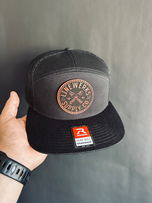 168-LP Richardson Seven-Panel Trucker Cap with Brown Leather Patch